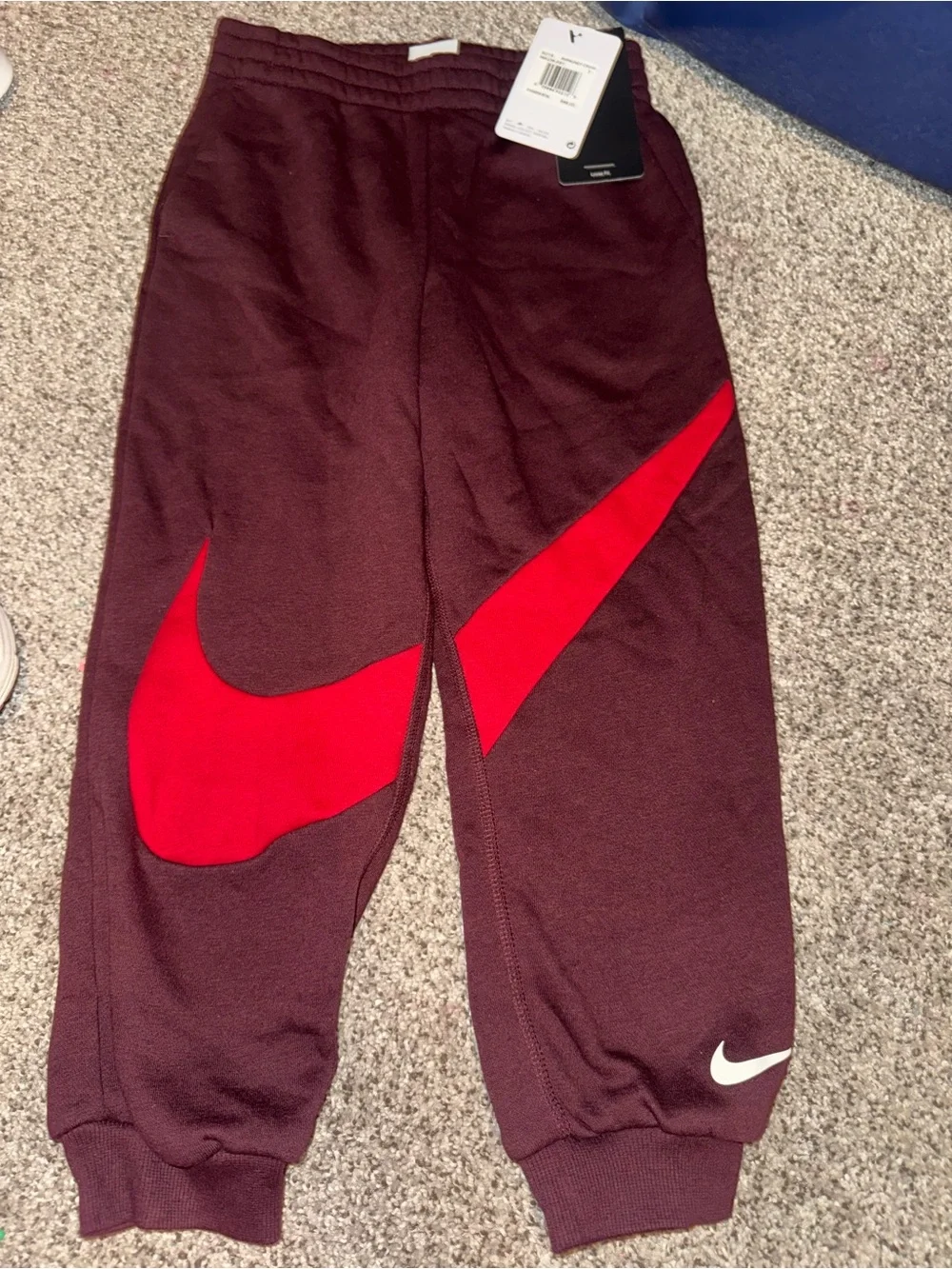 Nike Kids Maroon Joggers with Red Swoosh Accent